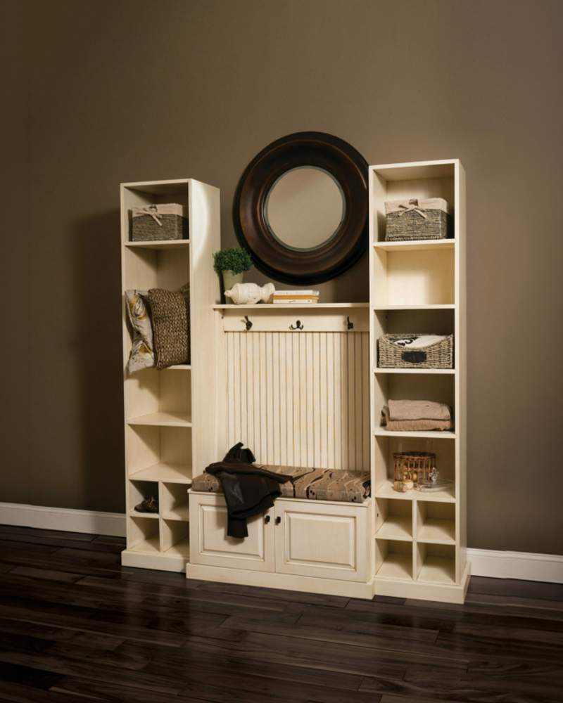 Exterior view of Heirloom Amish Furniture store, showing the storefront with signs and outdoor furniture displayed along the sidewalk.