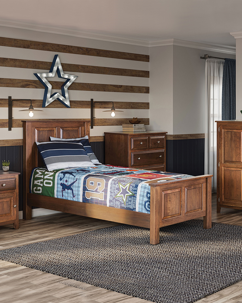 Solid wood children's furniture with bed, nightstand, chest, and armoire.