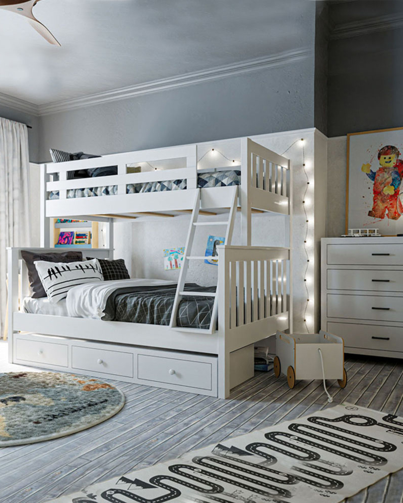 White children's bunk bed with trundle drawers in a modern kids bedroom.