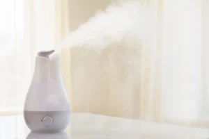 Humidifier adding moisture to dry indoor air for wood furniture care in Arizona