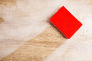 Sanding block used to smooth and restore the surface of wood furniture